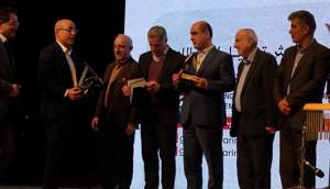 تجلیل از داروسازی بهوزان و دکتر بهرام ترکان در همایش کارآفرینان گیلان