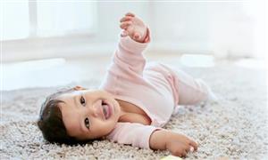 When Babies Start To Roll Over (and How To Encourage It)